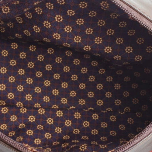 Bolso artesanal de mano de cuero y rafia en tono rojo